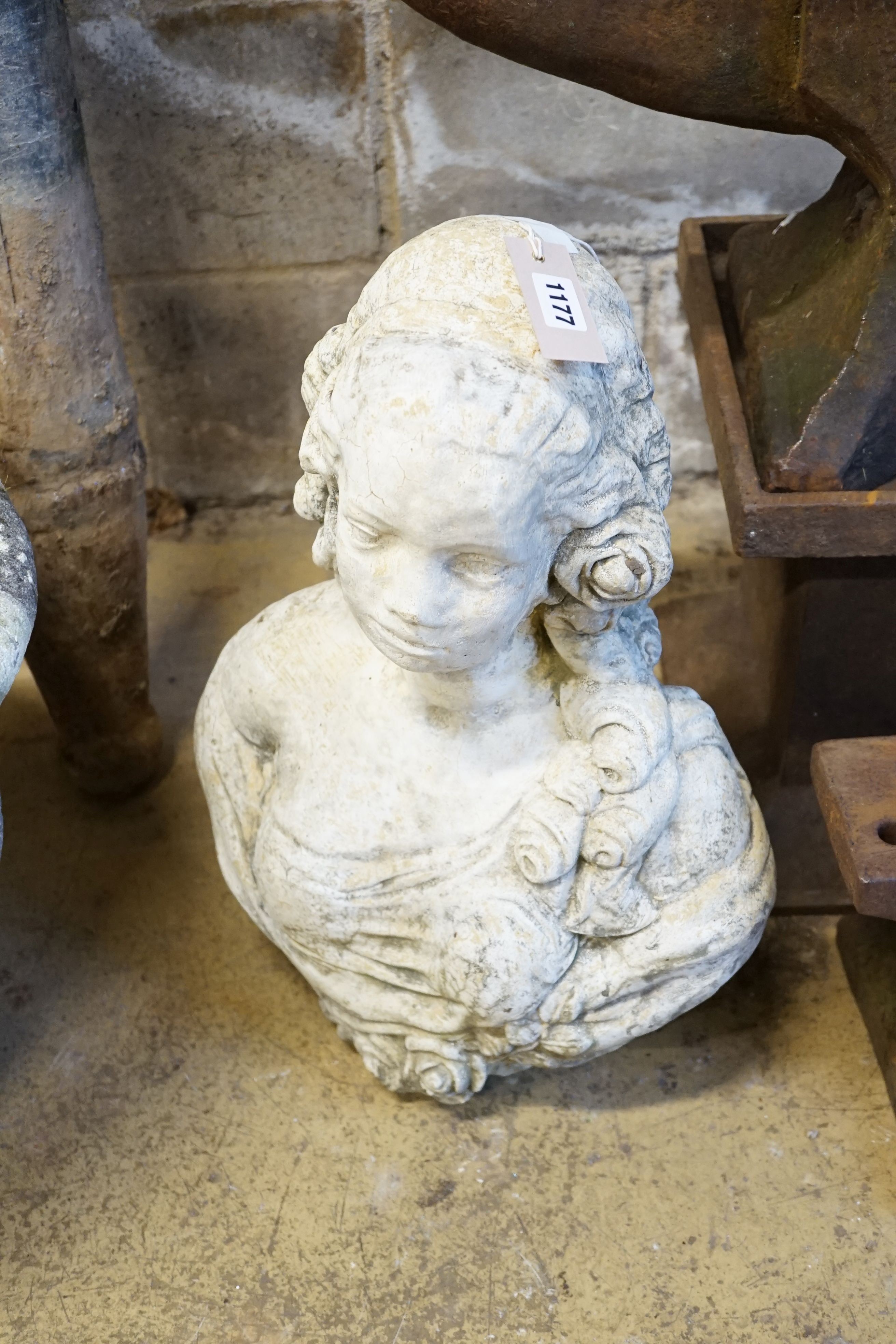 A reconstituted stone bust of 17th century lady, height 53cm